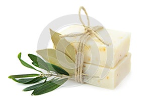 Natural herbal soaps with olive and bay leaf isolated on white background