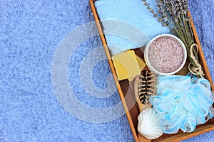 Natural herbal spa cosmetics with lavender extract - soap, salt, towel, massage brush, washcloth