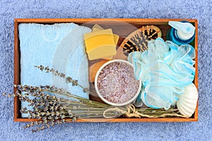 Natural herbal spa cosmetics with lavender extract - soap, salt, towel, massage brush, washcloth