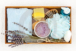 Natural herbal spa cosmetics with lavender extract - soap, salt, towel, massage brush, washcloth