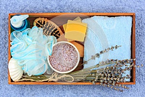 Natural herbal spa cosmetics with lavender extract - soap, salt, towel, massage brush, washcloth