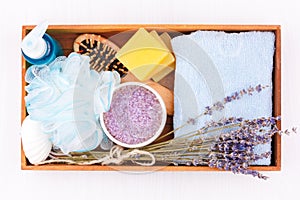 Natural herbal spa cosmetics with lavender extract - soap, salt, towel, massage brush, washcloth