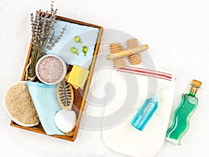 Natural herbal spa cosmetics with lavender extract - soap, salt, towel, massage brush, washcloth