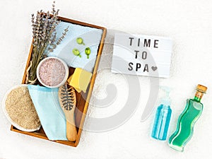 Natural herbal spa cosmetics with lavender extract - soap, salt, towel, massage brush, washcloth