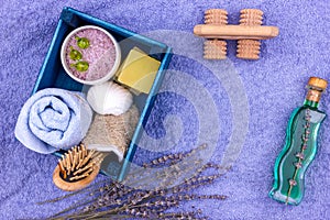 Natural herbal spa cosmetics with lavender extract - soap, salt, towel, massage brush, washcloth