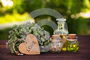 Natural herbs and oils. Aromatic thyme and magic elixir. The love drink. Love potion. Alternative medicine.