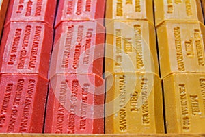 Natural honey and cinnamon handmade soap in wooden boxes at a ma