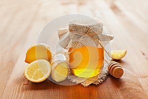 Natural honey in a pot or jar with twine tied in a bow