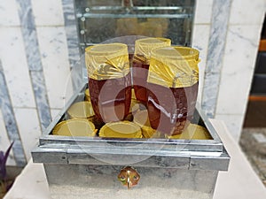 Natural Honey with stel box honey bee