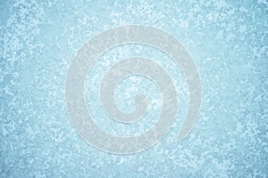 Natural ice ornament with a light frost pattern. Background