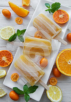 Natural juicy orange popsicles