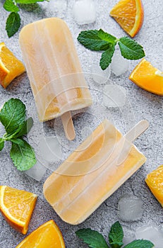 Natural juicy orange popsicles