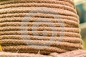 Natural jute rope, vegetable fiber woven thick thread close-up textured effect. Natural plant material. Hemp or linen rope.