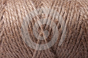 Natural jute twine as background. Macro view of linen thread. Texture of fiber pattern