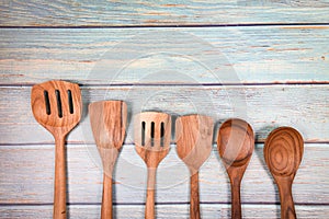 Natural kitchen tools wood products / Kitchen utensils background with spoon ladle spatula various sizes object utensil wooden