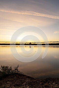 Natural landscape of a lake at sunset.