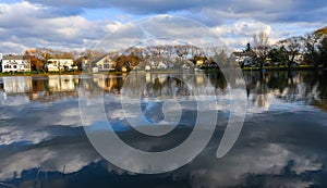 Natural Landscape, Reflection of clouds and lodges in the water of a quiet lake in New Jersey