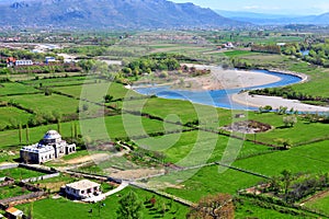 Natural landscape with a river in the field