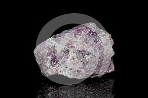 Lepidolite crystal ore on dark background