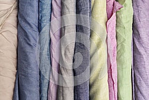 Natural linen fabric in roll background