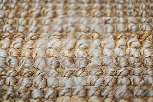 Natural linen texture for the background. Handmade rug made of jute. Jute knitted fabric