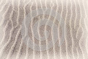 Natural lines in the sand beach background with space for text,