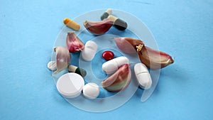 Natural medicine garlic, and various tablets of various colors