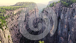 Natural miracle, Mountains Valley landscape with Forest and Trees, epic aerial drone flight over Huge Cliff and Rocks