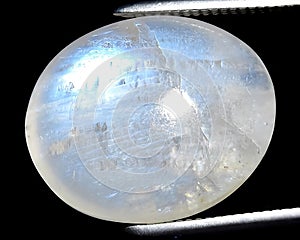 natural moonstone adular gem on the background