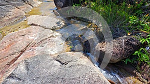 Natural Mountain Rocks And Fresh River Flows