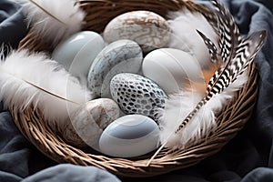 Natural nest with pebbles and feathers, Easter holiday decoration