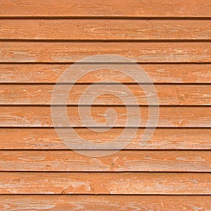 Natural old wood fence planks, wooden close board texture, overlapping light reddish brown closeboard terracotta background