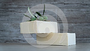 Natural Olive oil soap. Organic handmade soap bars with olive branch concept. Skin care products. Selective focus.