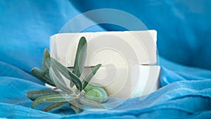 Natural Olive oil soap. Organic handmade soap bars with olive branch concept. Skin care products. Selective focus.