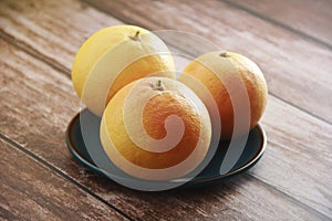 Natural orange fruit greupfruit on a plate