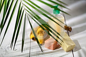 Natural organic bath products. towel, soap, shampoo bottle and l