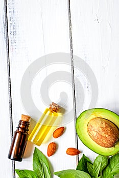 Natural organic cosmetic oils with avocado top view