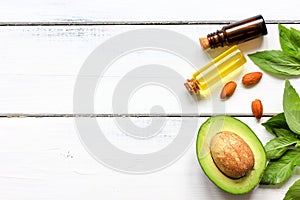 Natural organic cosmetic oils with avocado top view