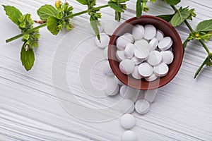 Natural organic pills with herbal plant