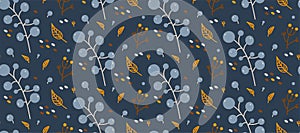 Natural pattern on a blue background with blueberries, dry plants and autumn leaves. Flat image for fabric and packaging