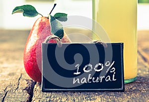 Natural pear juice on display