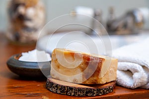 Natural personal care items on a wooden bathroom counter