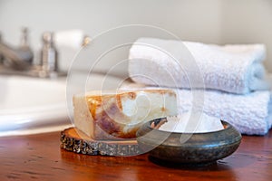 Natural personal care items on a wooden bathroom counter