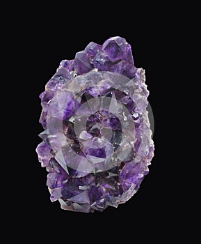 Natural piece of amethyst crystal isolated.