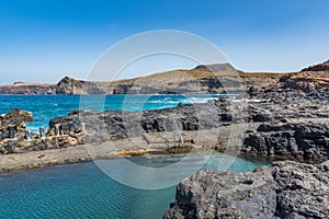 Natural pool Las Salinas de Agaete in Puerto de Las Nieves, Gran Canaria, Spain. Copy space for text photo