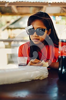 Natural portrait, Asian girl with sunglasses chilling