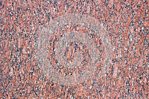 Natural red granite surface. Granite stone texture for background