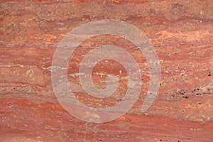 Natural red travertine texture in contrast tone. photo