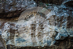 Natural rock cliff texture background closeup