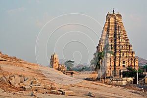 Natural rock formation and landscape and virupaksha temple at hampi karnataka india